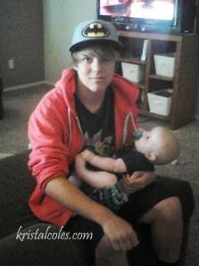 Brandon babysitting earlier this summer.  What a good Daddy he'll make!